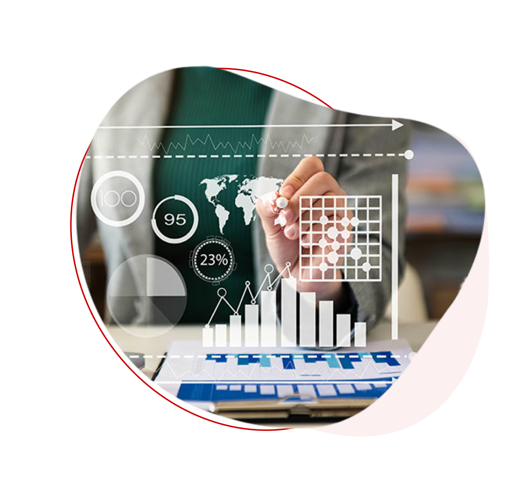 A close-up shows a person's hand using an interactive pen on a translucent screen displaying business analytics and global data, including bar graphs, pie charts, world map, and percentage readouts over a spreadsheet.